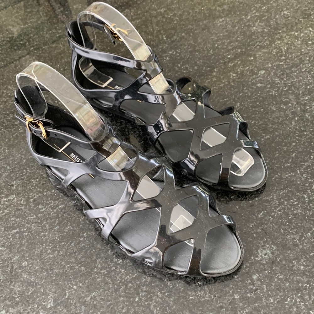 New, criss-cross jellies with closed back, ankle-strap. Melissa, size 7, black.